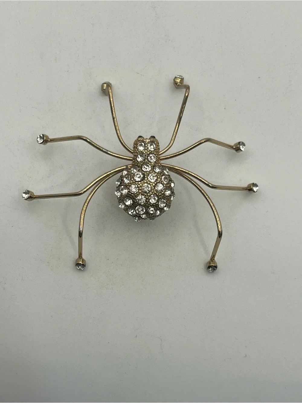 Spider insect gold tone clear rhinestone brooch pin